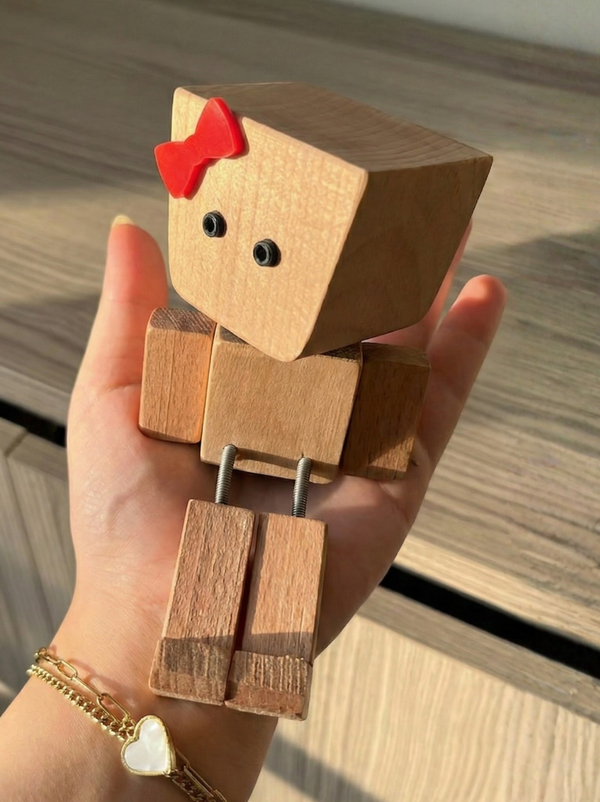 Female Mizooo handmade wooden desk figure with slim carved lines in natural beech wood